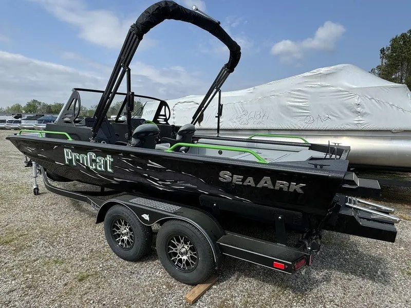 Slide: The Image of 2024 SeaArk ProCat 200 boat on a trailer, side view. - 6