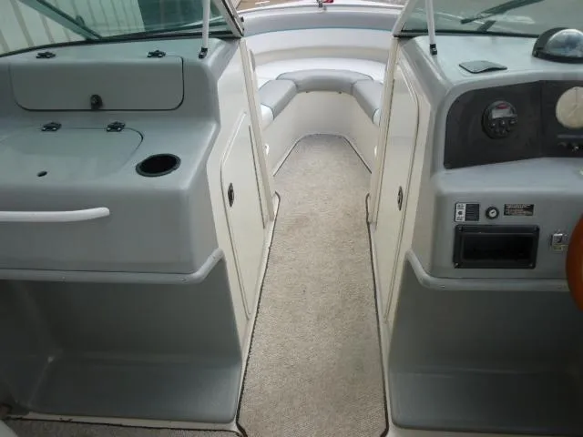 Slide: The Image of 1992 Tiara Sport 250 boat interior with seating and control panel. - 14