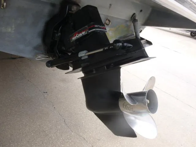 Slide: The Image of 1992 Tiara Sport 250 boat with a MerCruiser outdrive and propeller. - 4