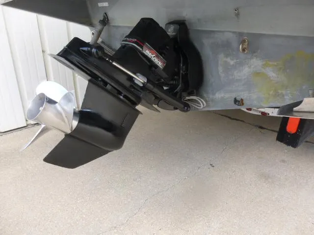 Slide: The Image of 1992 Tiara Sport 250 boat outboard motor and propeller detail. - 5