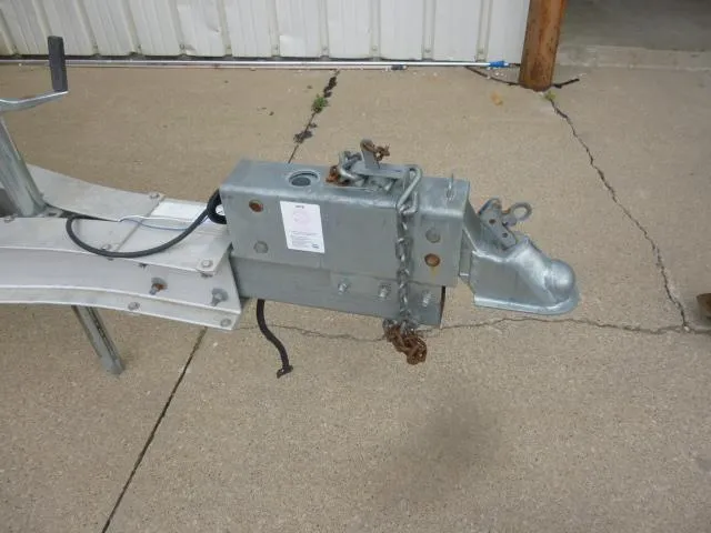 Slide: The Image of Trailer hitch mechanism on concrete, Tiara Sport 250, 1992 model. - 7