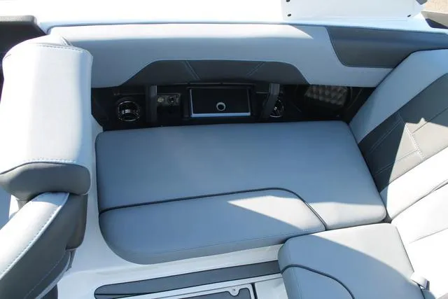 Slide: The Image of 2024 Malibu 20 VTX boat interior with sleek gray seating and modern design. - 8