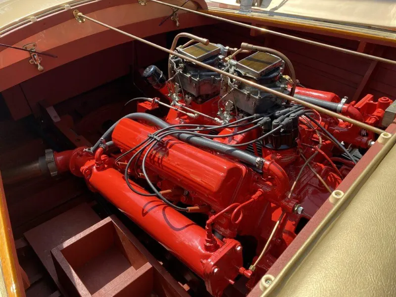 Slide: The Image of 1955 Chris-Craft Cobra 21 engine, vibrant red, detailed view. - 25