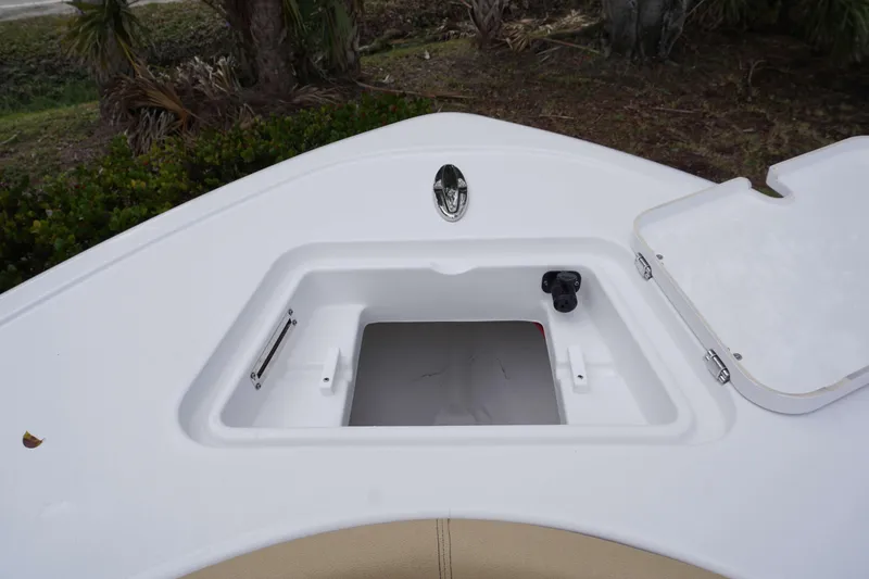 Slide: The Image of 2024 Sportsman 212 Open boat storage compartment with open hatch. - 18