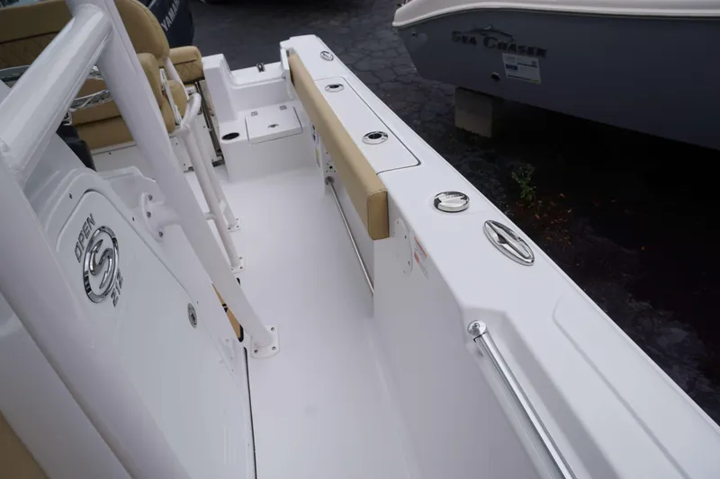 Slide: The Image of 2024 Sportsman 212 Open boat interior with seating and storage compartments. - 20