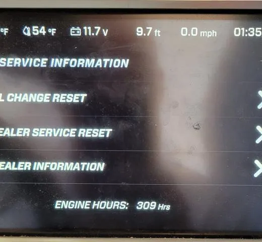Slide: The Image of MasterCraft X22 2019 dashboard displaying service information and engine hours at 309. - 9