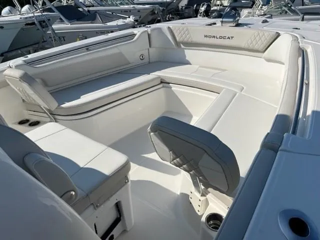 Slide: The Image of 2024 World Cat 295 CC boat interior with spacious seating and modern design. - 3
