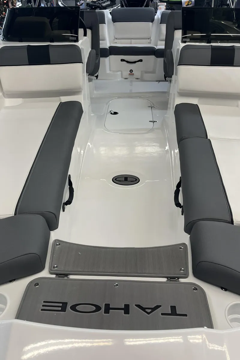 Slide: The Image of 2024 Tahoe T21 boat interior with gray and white seating. - 3