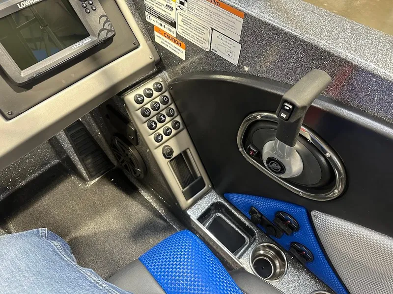 Slide: The Image of 2024 Ranger 1850MS boat interior with control panel and seat details. - 19