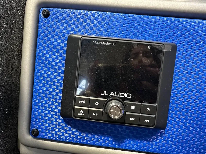 Slide: The Image of JL Audio MediaMaster 50 installed in 2024 Ranger 1850MS boat dashboard. - 23