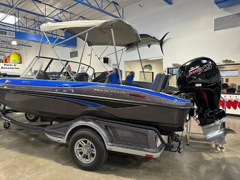 Slide: The Image of 2024 Ranger 1850MS boat with canopy and motor in showroom. - 5