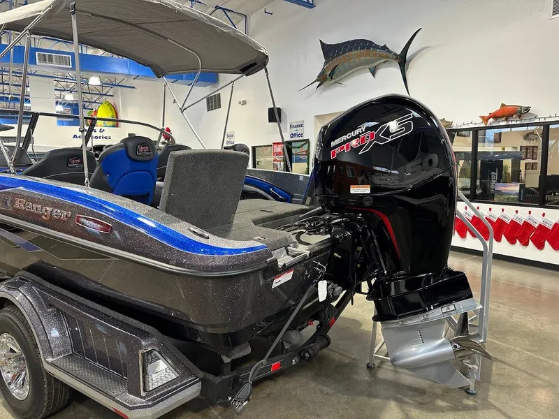 Slide: The Image of 2024 Ranger 1850MS boat with Mercury Pro XS engine in showroom. - 6