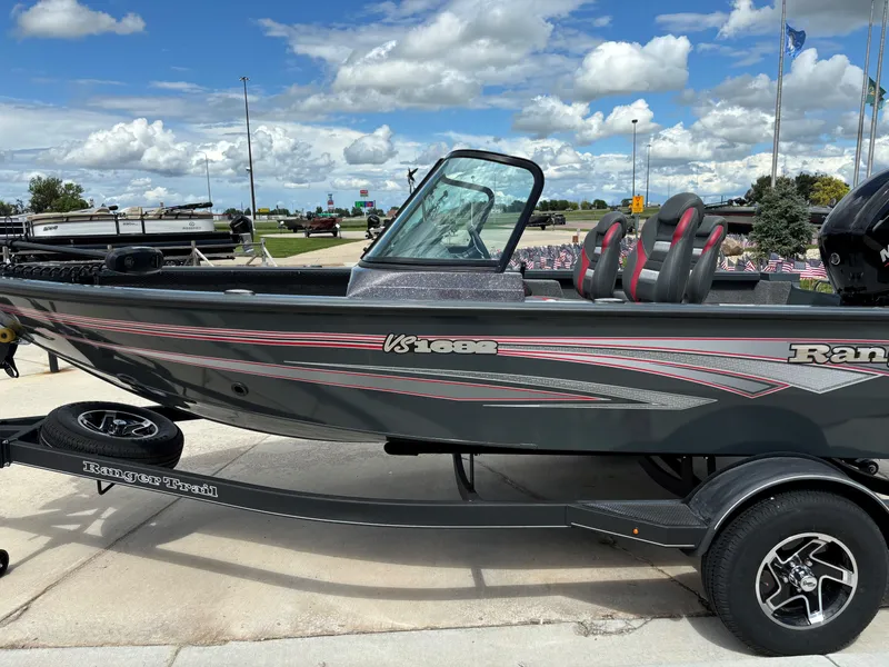 The Image of 2024 Ranger VS1682SC Angler fishing boat on trailer, side view, outdoors. - 0