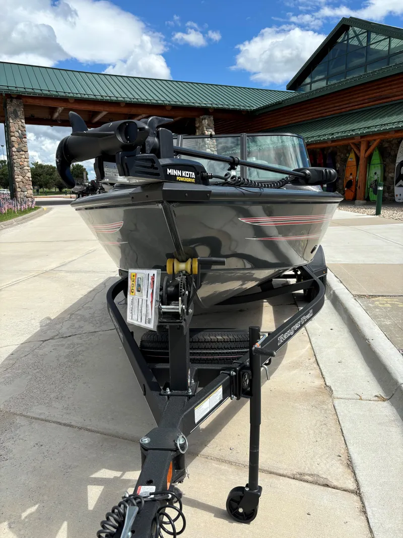 Slide: The Image of 2024 Ranger VS1682SC Angler boat on trailer, front view, outdoors. - 2