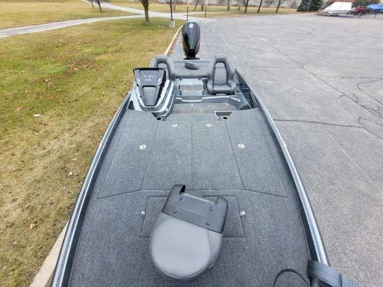 Slide: The Image of 2024 Nitro Z21 XL Pro fishing boat with spacious deck and seating. - 5
