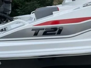 Slide: The Image of 2024 Tahoe T21 boat with sleek design and modern features. - 1
