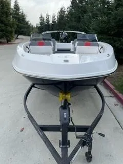 Slide: The Image of 2024 Tahoe T21 boat on trailer, front view. - 2