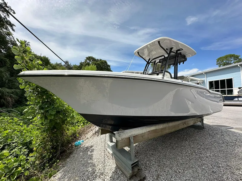 Slide: The Image of 2024 Key West 239 FS boat on display outdoors, clear sky background. - 0