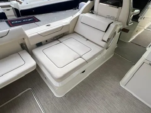 Slide: The Image of 2023 Chris-Craft Calypso 35 interior with plush seating and modern design. - 11