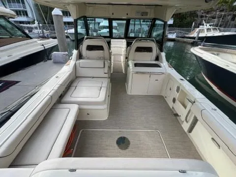 Slide: The Image of 2023 Chris-Craft Calypso 35 boat interior with spacious seating and modern design. - 8