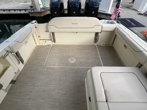 Slide: The Image of 2023 Chris-Craft Calypso 35 boat interior with spacious seating and elegant design. - 9