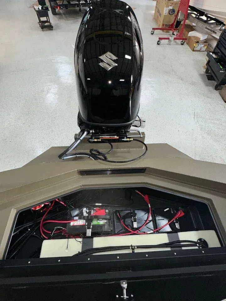 Slide: The Image of 2024 Thor Lake Hammer 1860 SC boat engine and battery compartment. - 8