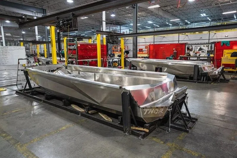 Slide: The Image of 2024 Thor Lake Hammer 1860 SC boat in manufacturing facility. - 9