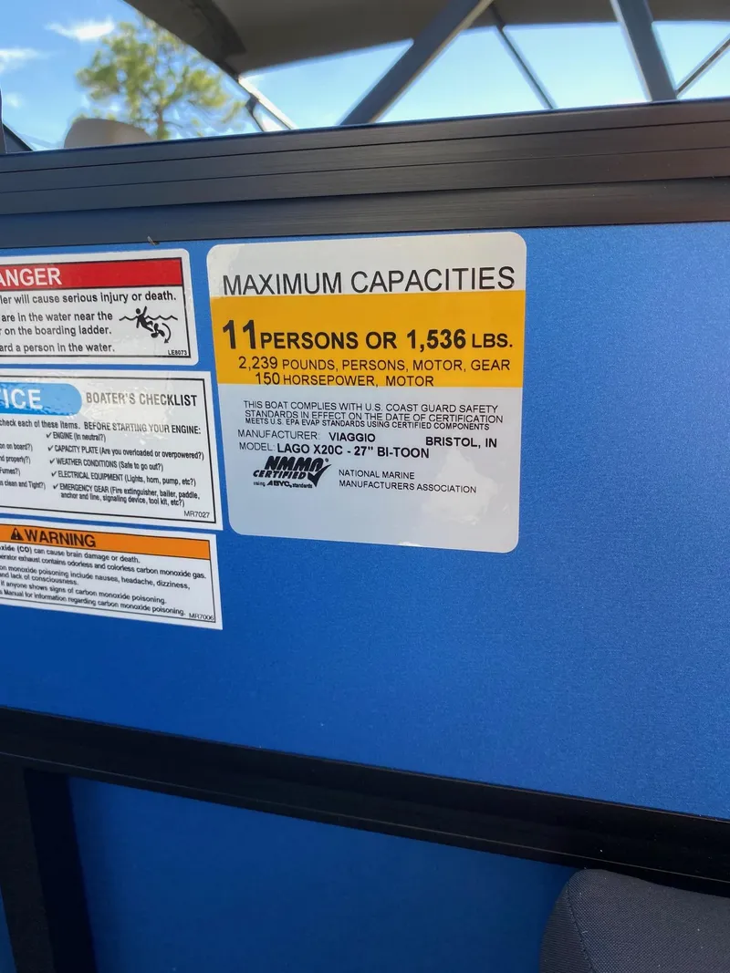 Slide: The Image of 2024 Viaggio Lago 20C capacity label: 11 persons or 1,536 lbs, 150 horsepower motor. - 14