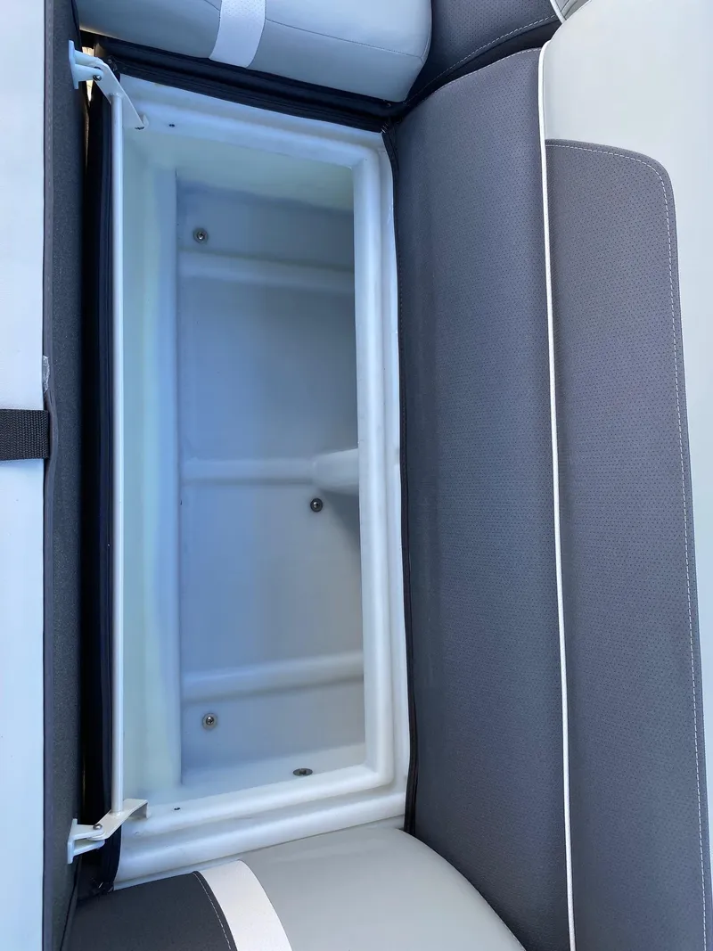 Slide: The Image of 2024 Viaggio Lago 20C boat seat storage compartment, open and empty. - 22