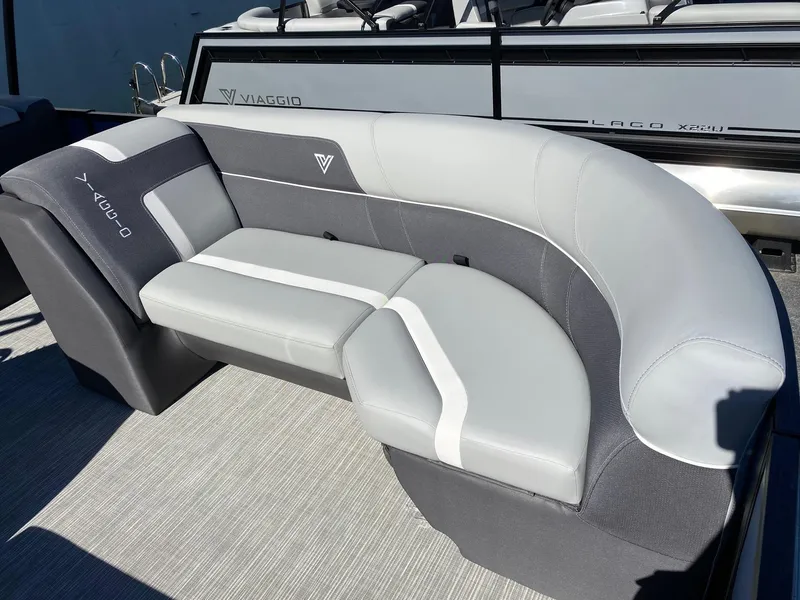 Slide: The Image of 2024 Viaggio Lago 20C boat interior with stylish gray seating and modern design. - 25