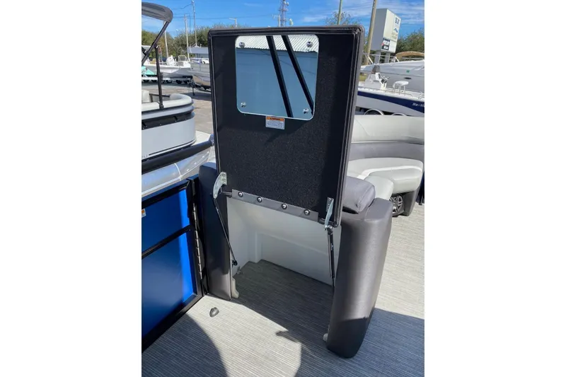 Slide: The Image of 2024 Viaggio Lago 20C boat interior with seating and storage compartment. - 34