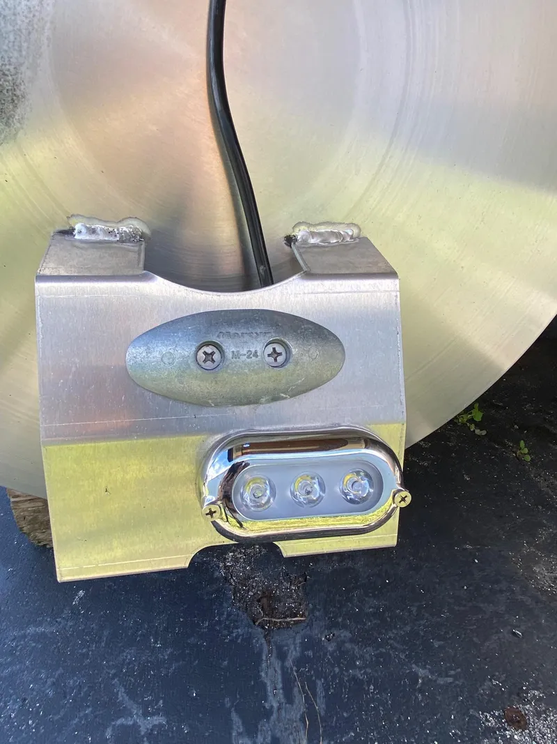 Slide: The Image of Close-up of a 2024 Viaggio Lago 20C metal component with LED lights. - 36