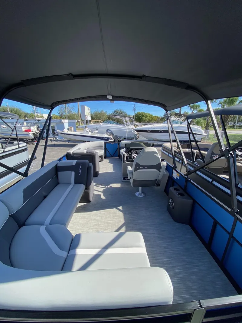 Slide: The Image of 2024 Viaggio Lago 20C pontoon boat with spacious seating and modern design. - 4