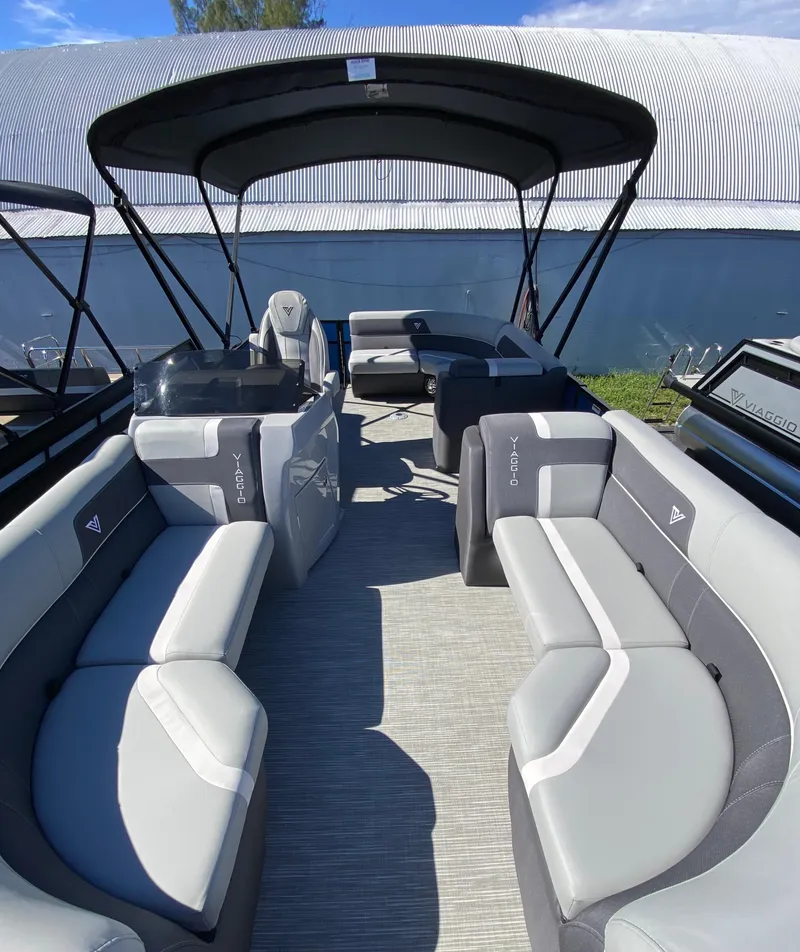 Slide: The Image of 2024 Viaggio Lago 20C pontoon boat with spacious seating and modern design. - 5