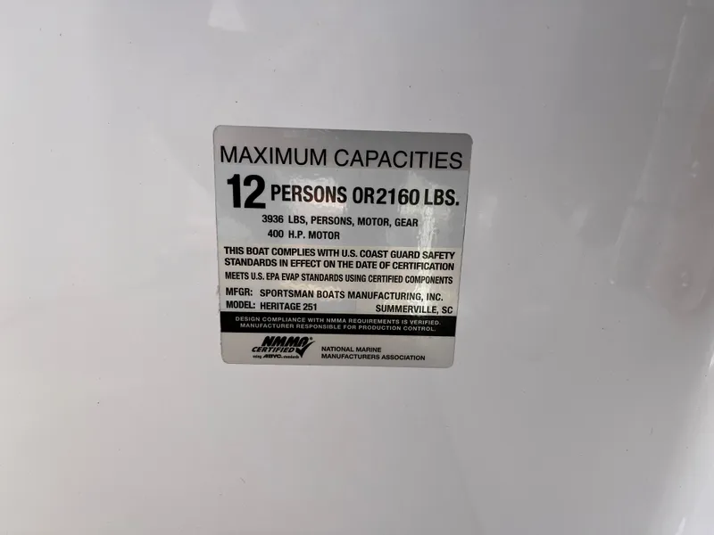 Slide: The Image of Maximum capacities label on 2021 Sportsman Heritage 251 Center Console boat. - 11