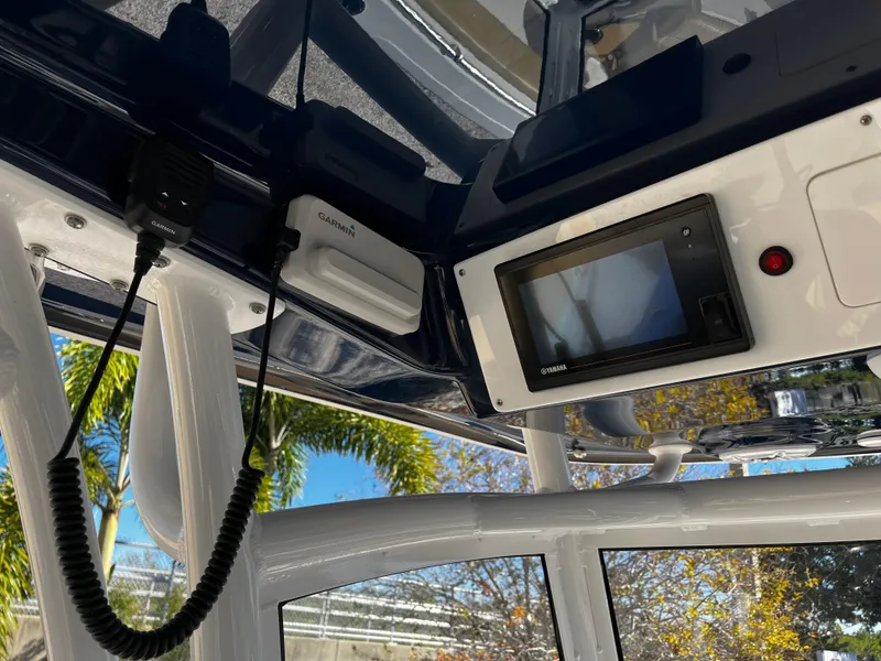 Slide: The Image of 2021 Sportsman Heritage 251 Center Console electronics and navigation equipment. - 24