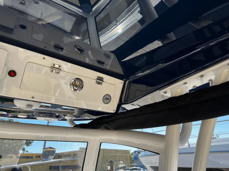 Slide: The Image of 2021 Sportsman Heritage 251 Center Console interior roof and control panel. - 25