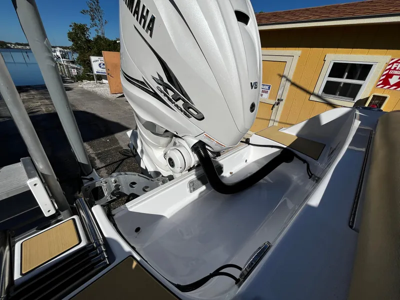 Slide: The Image of 2021 Sportsman Heritage 251 Center Console with Yamaha V8 outboard engine. - 6