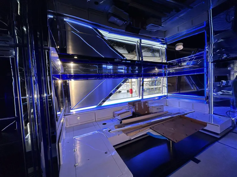 Slide: The Image of Luxurious interior of 1992 Heesen 141 Motor Yacht with modern blue LED lighting. - 17
