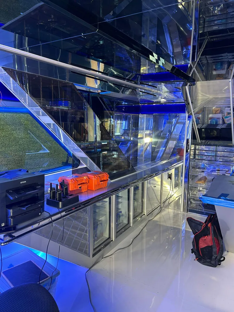 Slide: The Image of Modern interior of 1992 Heesen 141 Motor Yacht with sleek design and blue lighting. - 18