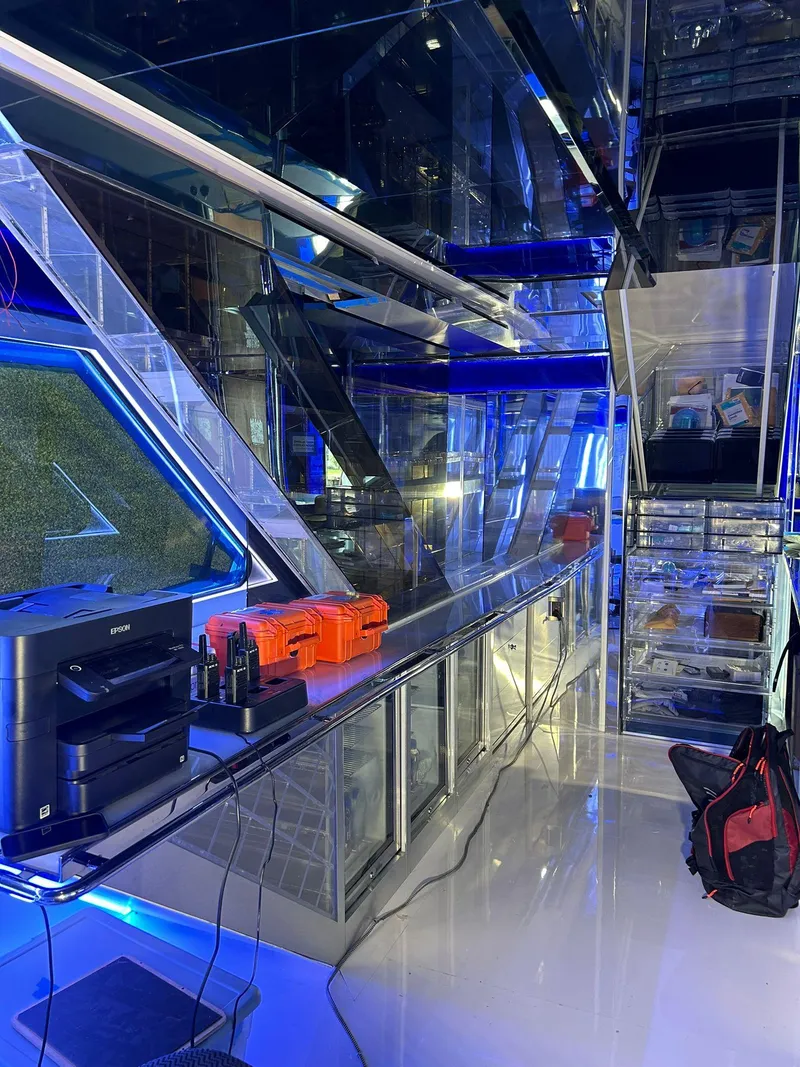 Slide: The Image of Modern interior of 1992 Heesen 141 Motor Yacht with sleek design and blue lighting. - 19