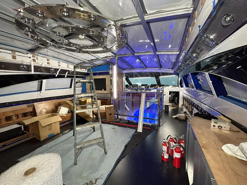 Slide: The Image of Interior of 1992 Heesen 141 Motor Yacht under renovation with ladder and fire extinguishers. - 28
