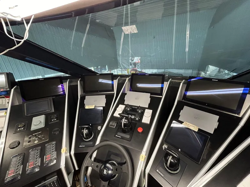 Slide: The Image of Control panel of a 1992 Heesen 141 Motor Yacht with advanced navigation systems. - 35