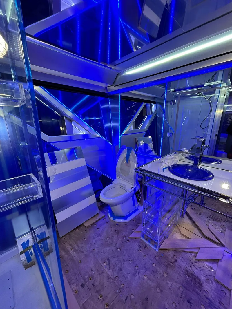 Slide: The Image of Luxurious bathroom with blue lighting on a 1992 Heesen 141 Motor Yacht. - 43