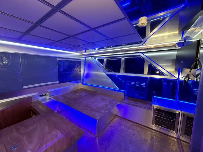 Slide: The Image of Luxurious interior of 1992 Heesen 141 Motor Yacht with modern blue LED lighting. - 47
