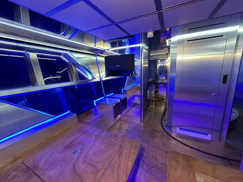 Slide: The Image of Luxurious interior of 1992 Heesen 141 Motor Yacht with modern lighting and sleek design. - 48