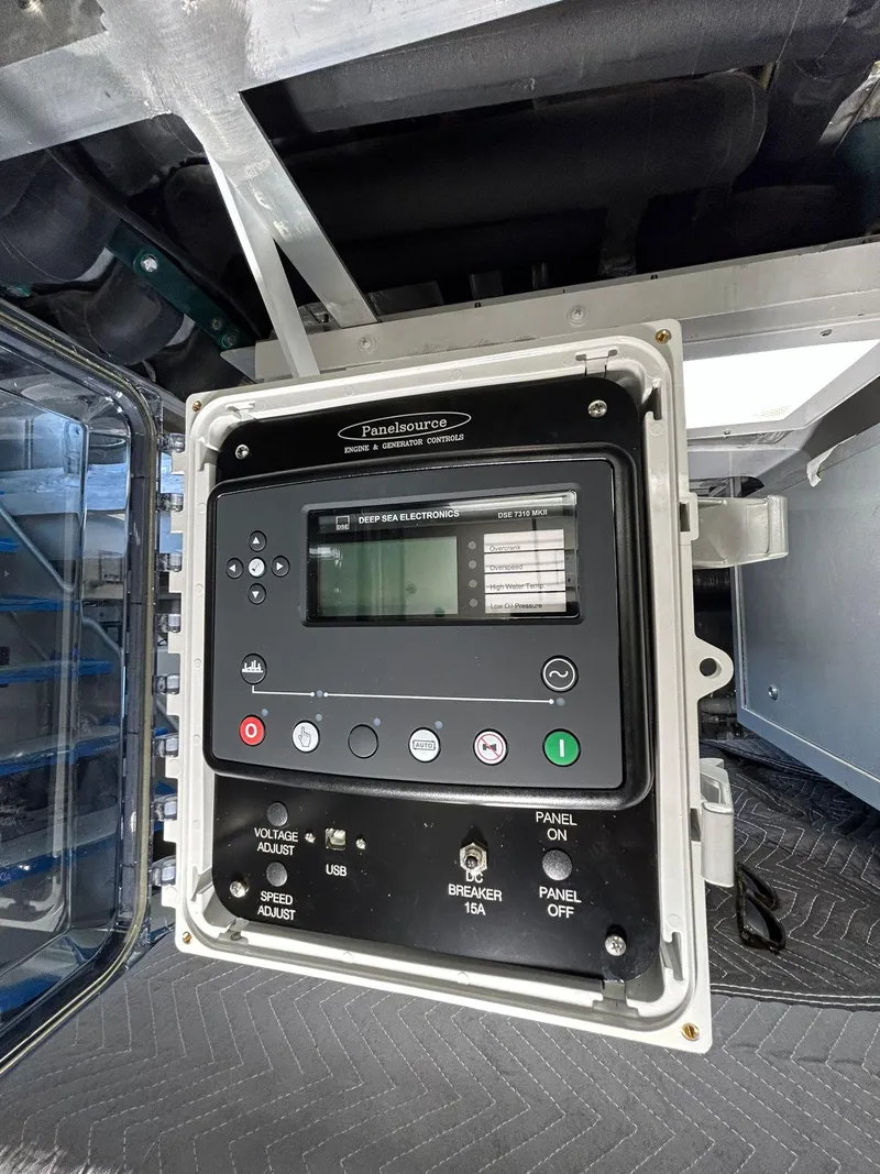 Slide: The Image of Control panel inside 1992 Heesen 141 Motor Yacht, featuring various buttons and display screen. - 5