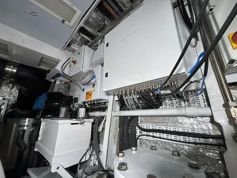 Slide: The Image of Engine room of 1992 Heesen 141 Motor Yacht with electrical panels and wiring. - 6