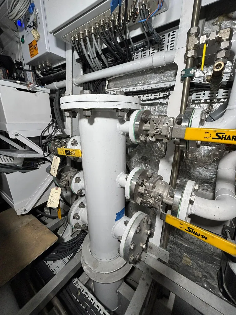 Slide: The Image of Engine room of 1992 Heesen 141 Motor Yacht with pipes and valves. - 7