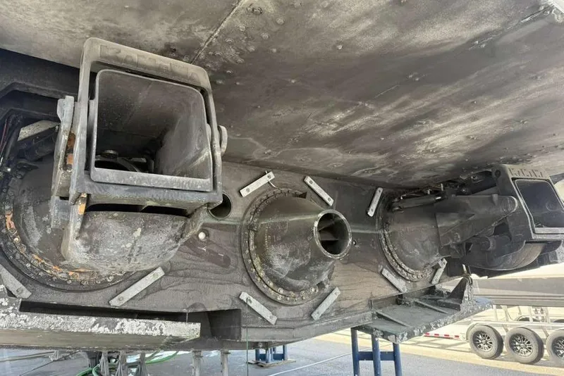 Slide: The Image of Underside view of a 1992 Heesen 141 Motor Yacht, showcasing propulsion system details. - 83